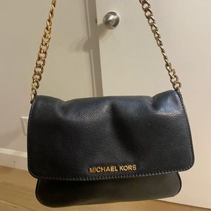 Michael kors crossbody black and gold bag